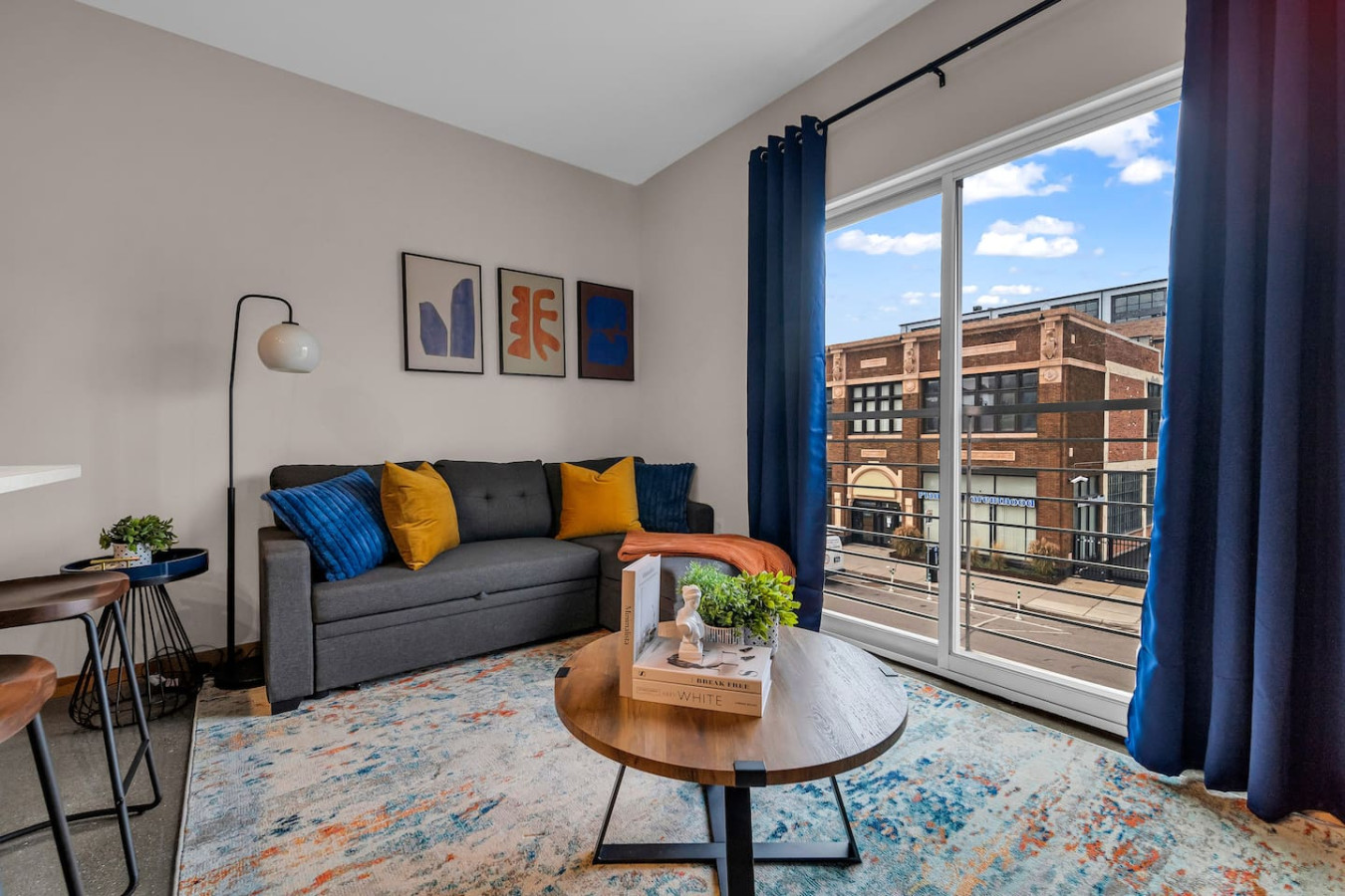 You feel a sense of peace as you step into the living room , with its inviting decor and soothing tones.