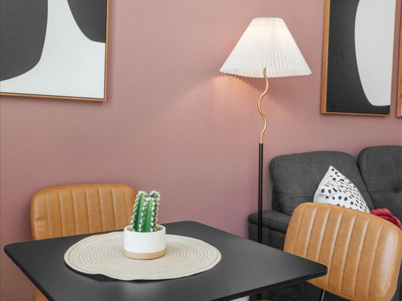 You feel a sense of peace as you step into the living room , with its inviting decor and soothing tones.