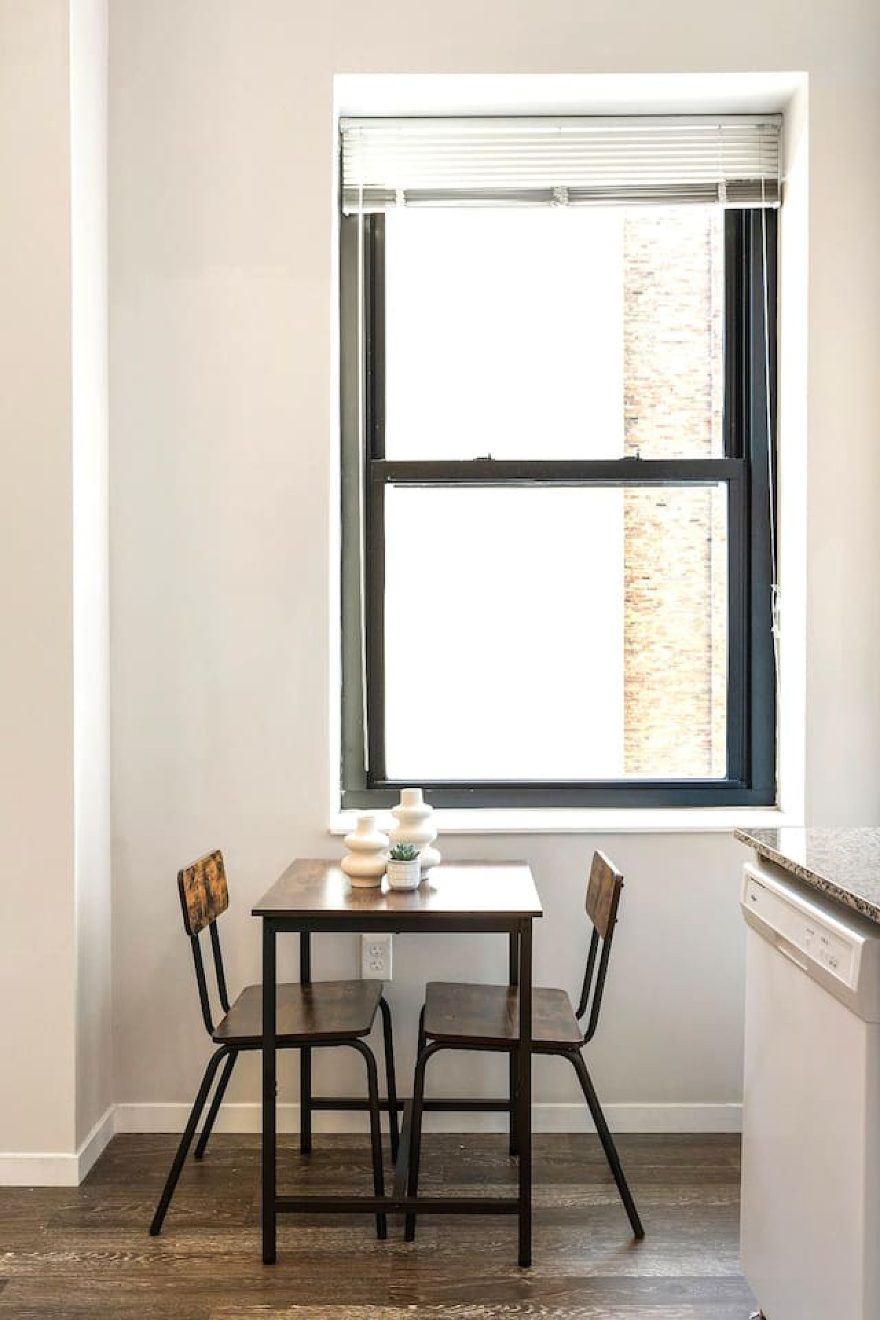 The dining area encourages you to gather with friends, enjoy a drink, and create lasting memories.