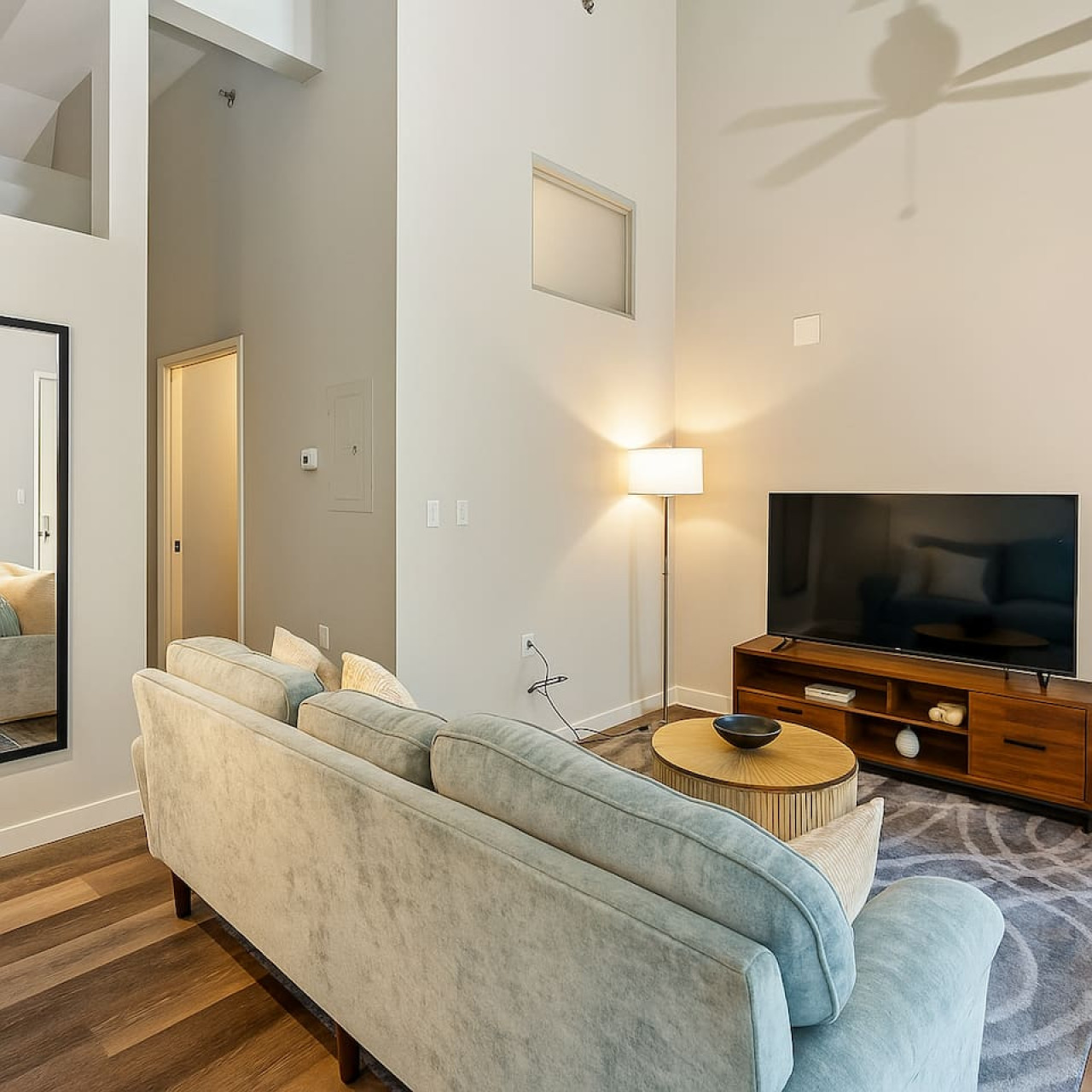 As you take a seat in the living room, the comfortable furniture and tasteful design make it easy to unwind.