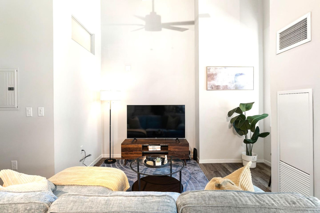 Relax in this warm, inviting space with warm accents and cozy furnishings. You’ll love unwinding on the plush sofa, enjoying or streaming your favorite shows in a serene atmosphere
