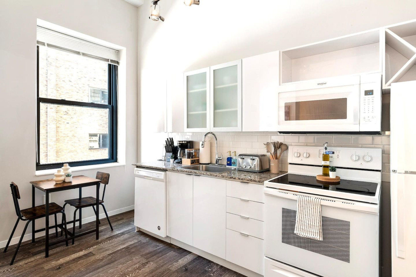 As you approach kitchen the elegant layout and well-stocked shelves make it the ideal spot to relax.