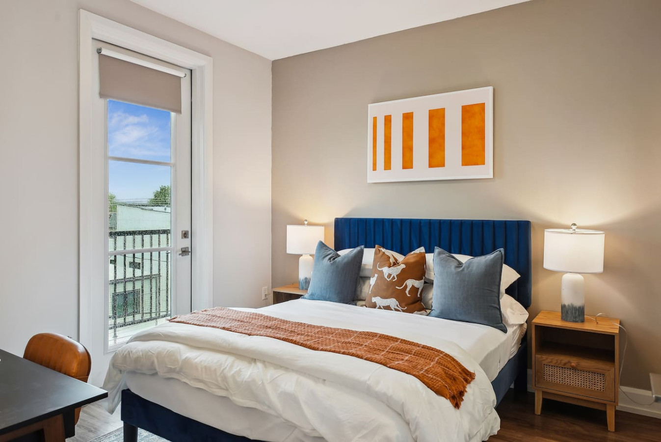 The bedroom’s serene ambiance invites you to relax, with a plush bed that promises a restful night's sleep.