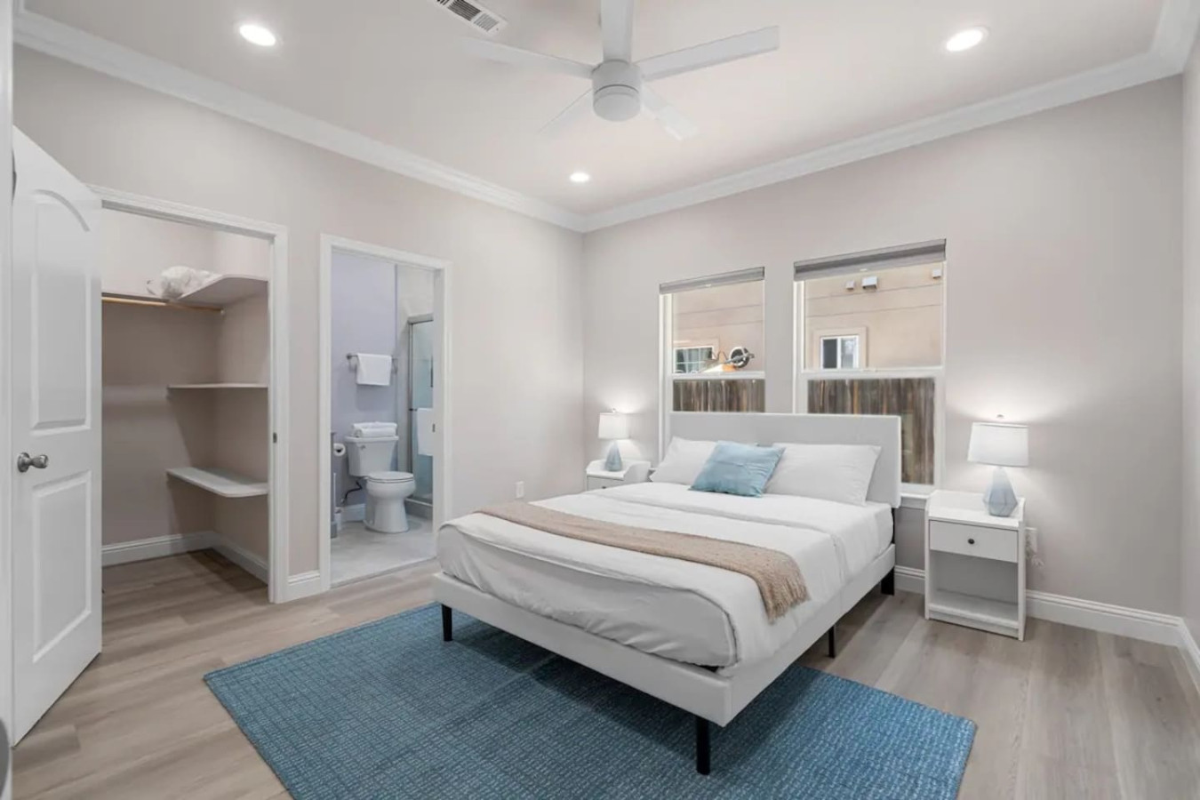 The bedroom’s serene ambiance invites you to relax, with a plush bed that promises a restful night's sleep.