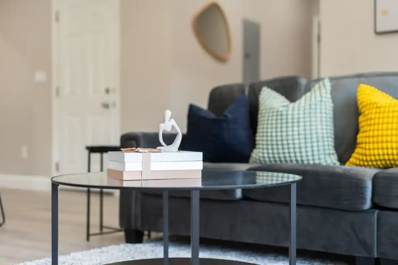 As you take a seat in the living room, the comfortable furniture and tasteful design make it easy to unwind.