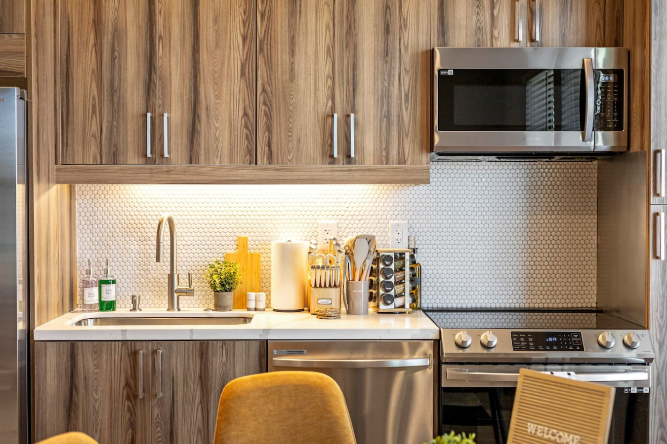Gorgeous open-concept kitchen with stainless steel appliances