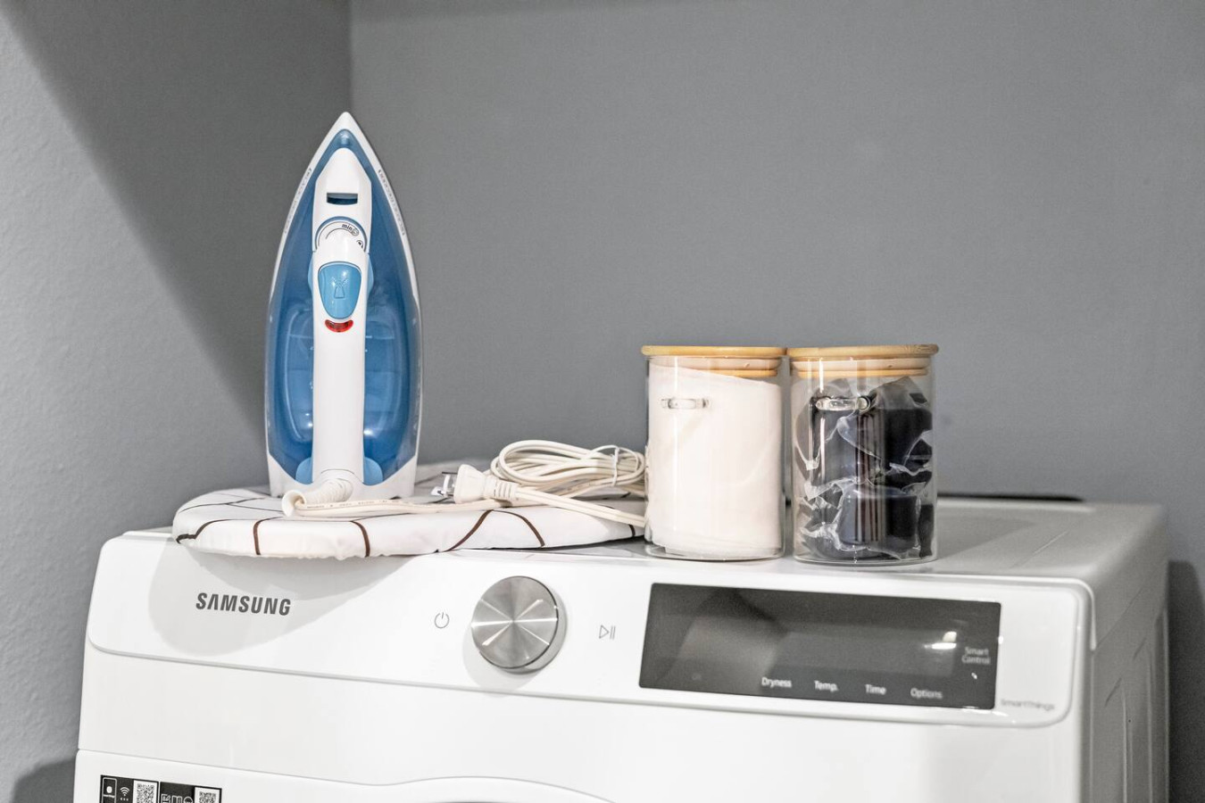 Includes iron, ironing board, laundry detergent, dryer sheets, and lint roller to keep your wardrobe fresh and tidy