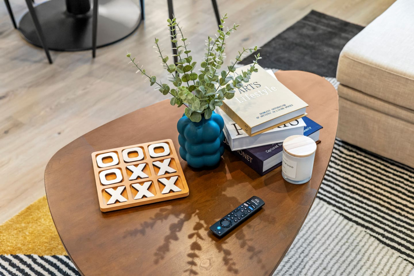 Tic-tac-toe and cozy vibes await on the coffee table.