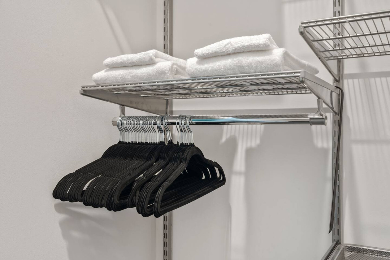 Quality hangers for wrinkle-free clothes and fresh linens stocked and ready (because the little details make all the difference).