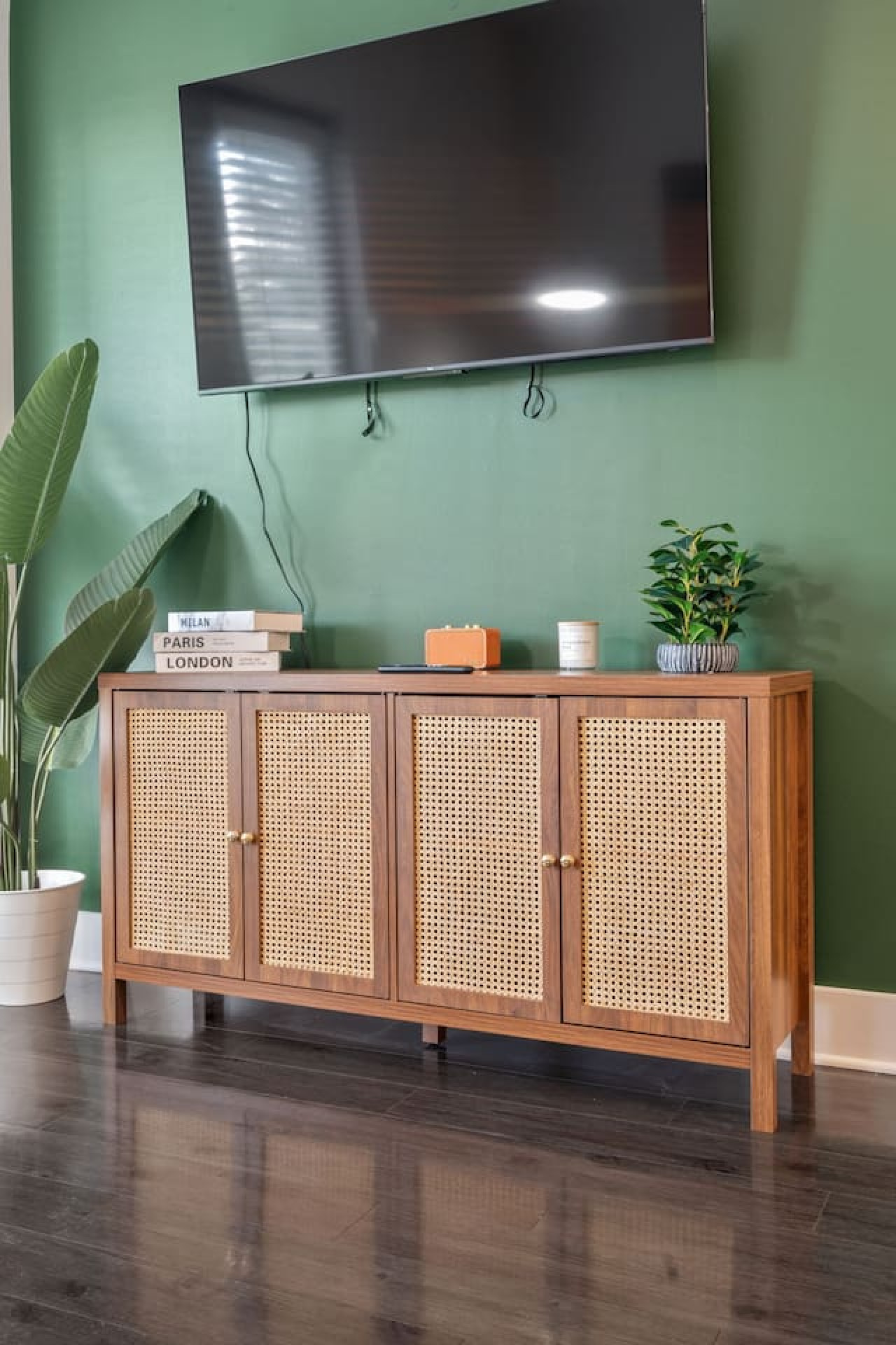 Smart TV with streaming services plus stylish storage for your belongings in this thoughtfully curated entertainment area