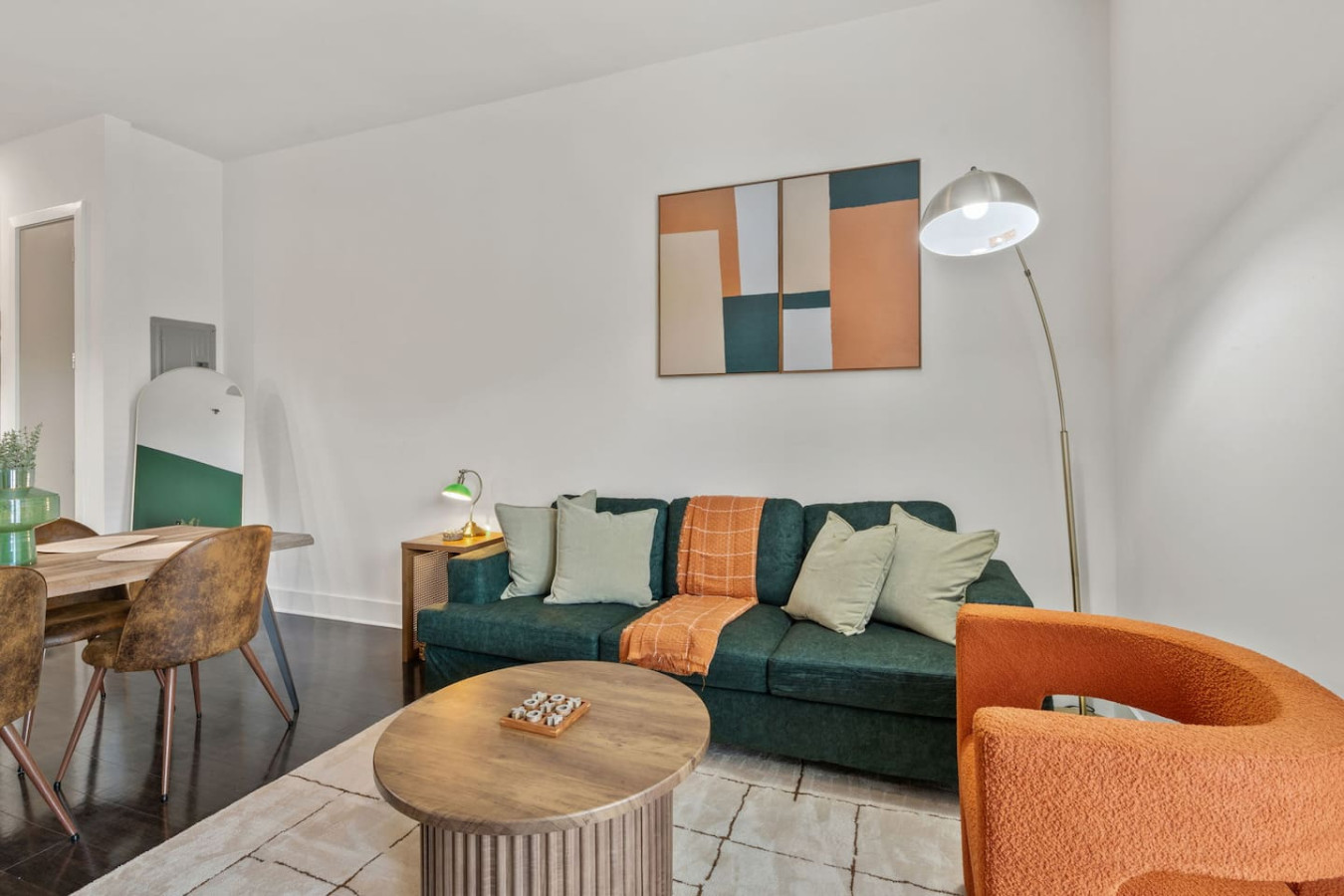 Sink into plush seating while staying connected to the kitchen and dining areas