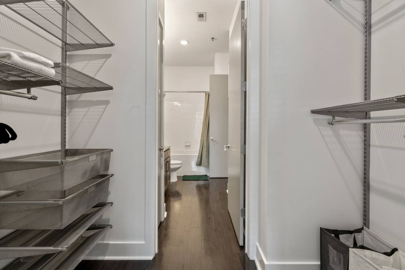 Generous closet space with adjustable shelving, multiple hanging rods, and drawers means you can truly make yourself at home.