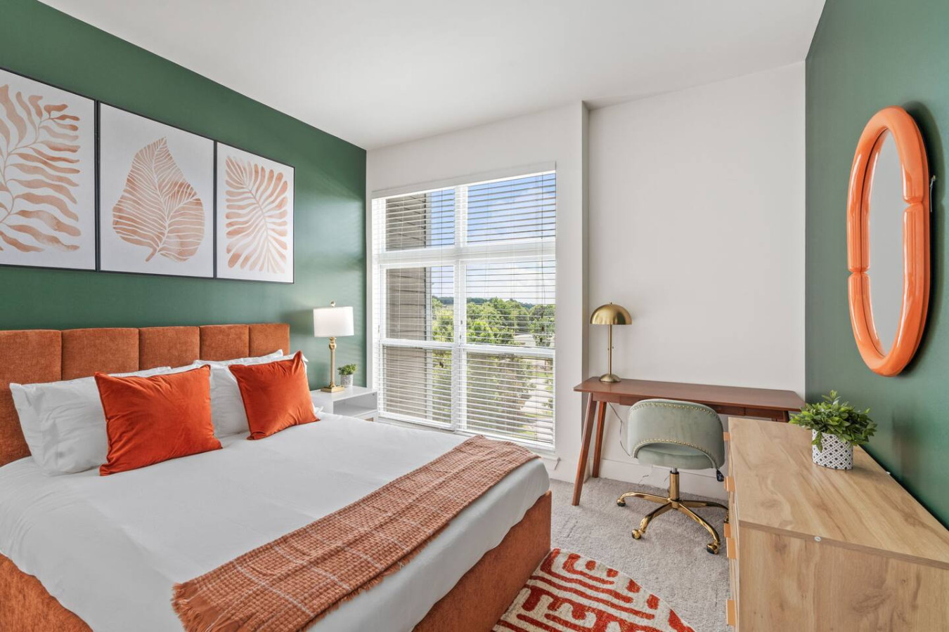 Work-friendly bedroom with professional desk setup, premium bedding, and quiet atmosphere ideal for video calls and restful sleep