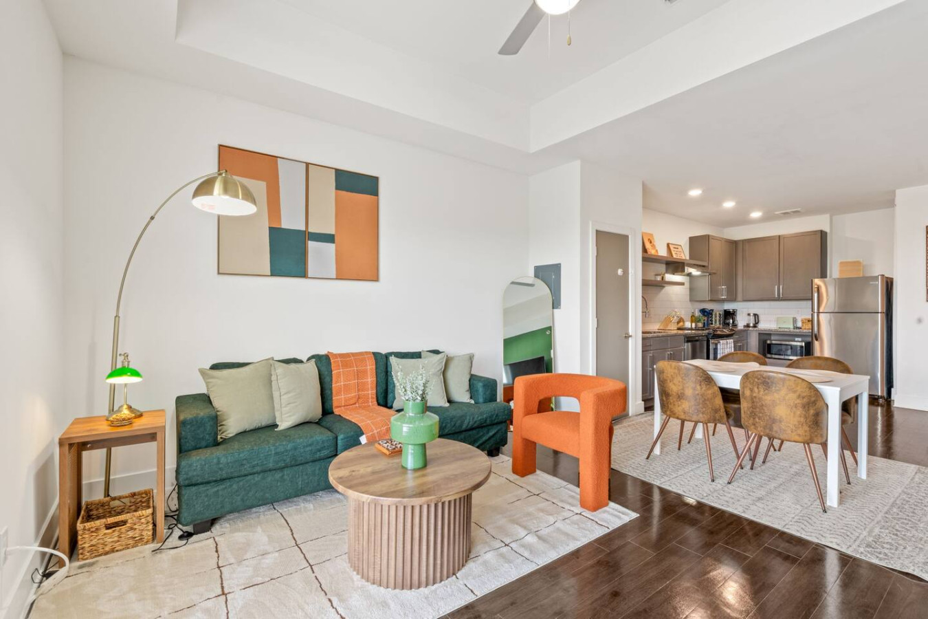 Spacious great room with designer furniture and flowing layout ideal for families or friends traveling together: cook, dine, and relax in one seamless space