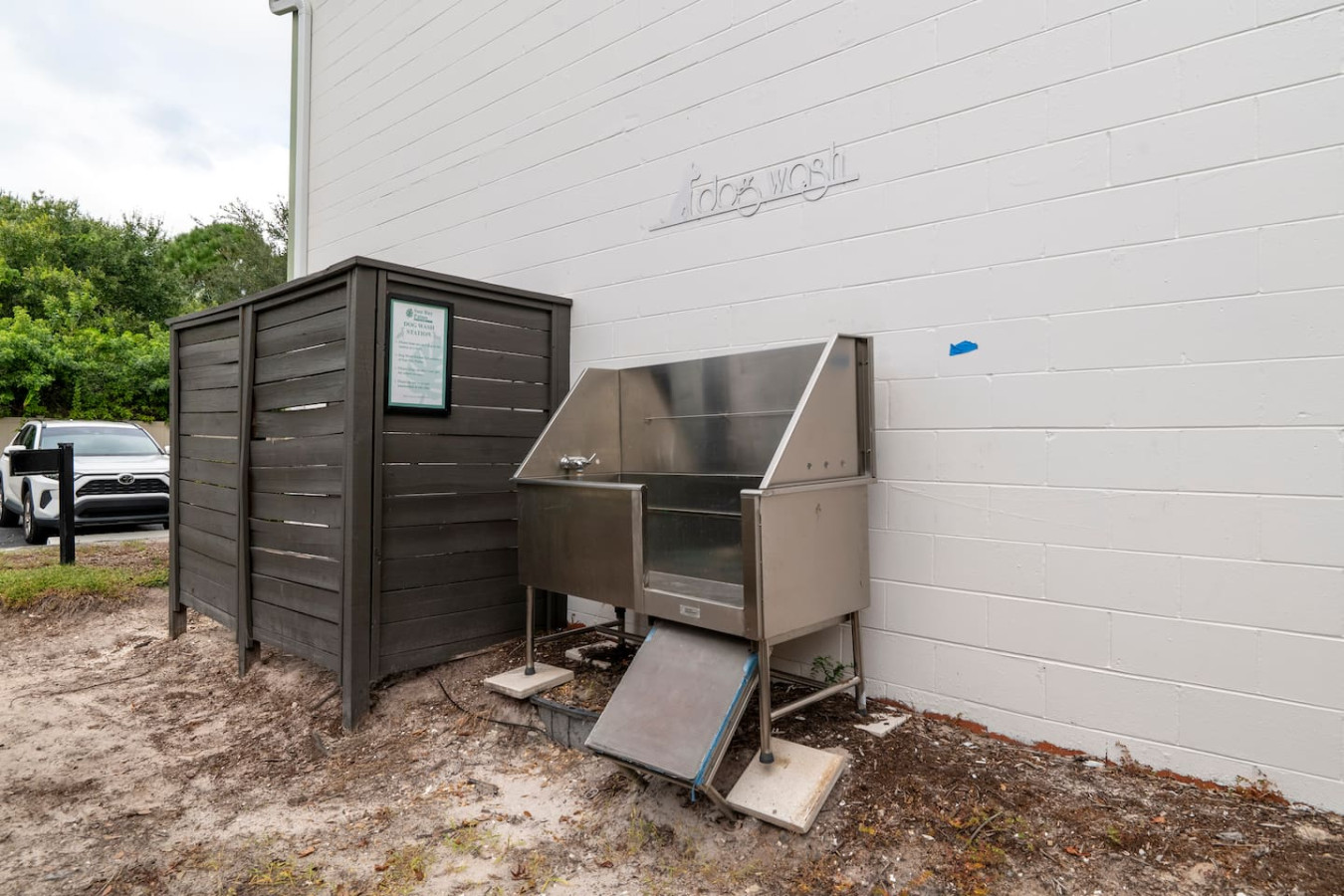 Convenient outdoor pet wash station — perfect after park or beach adventures!