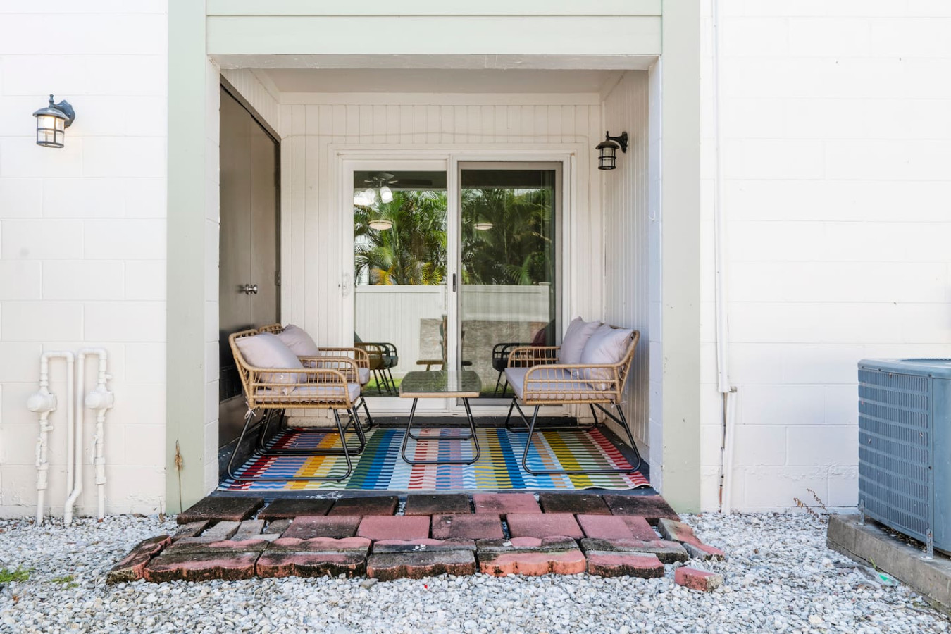 Relax on the cozy outdoor patio — perfect for morning coffee or evening chats