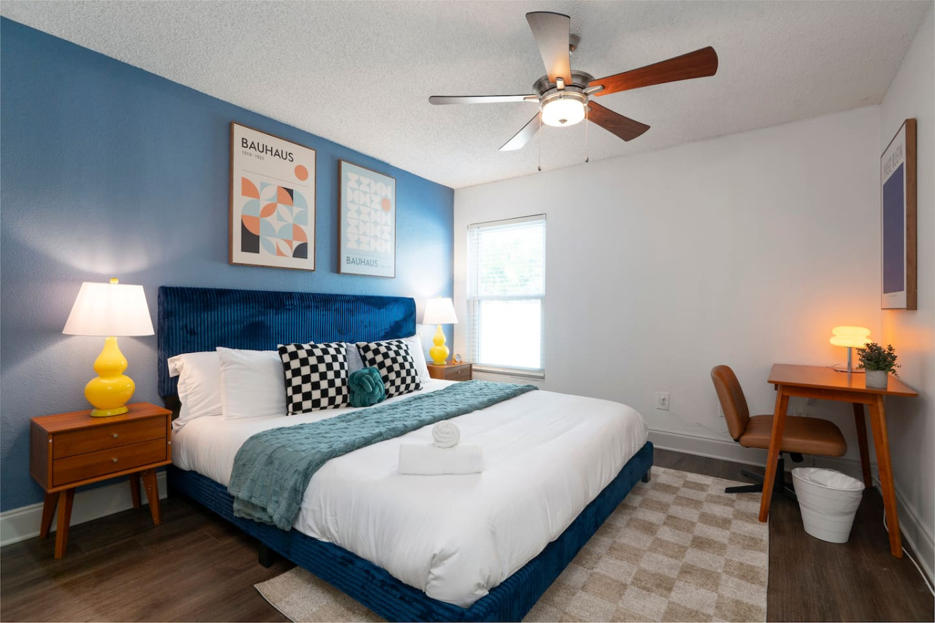 ✨ Spacious primary bedroom with plush king bed for restful nights