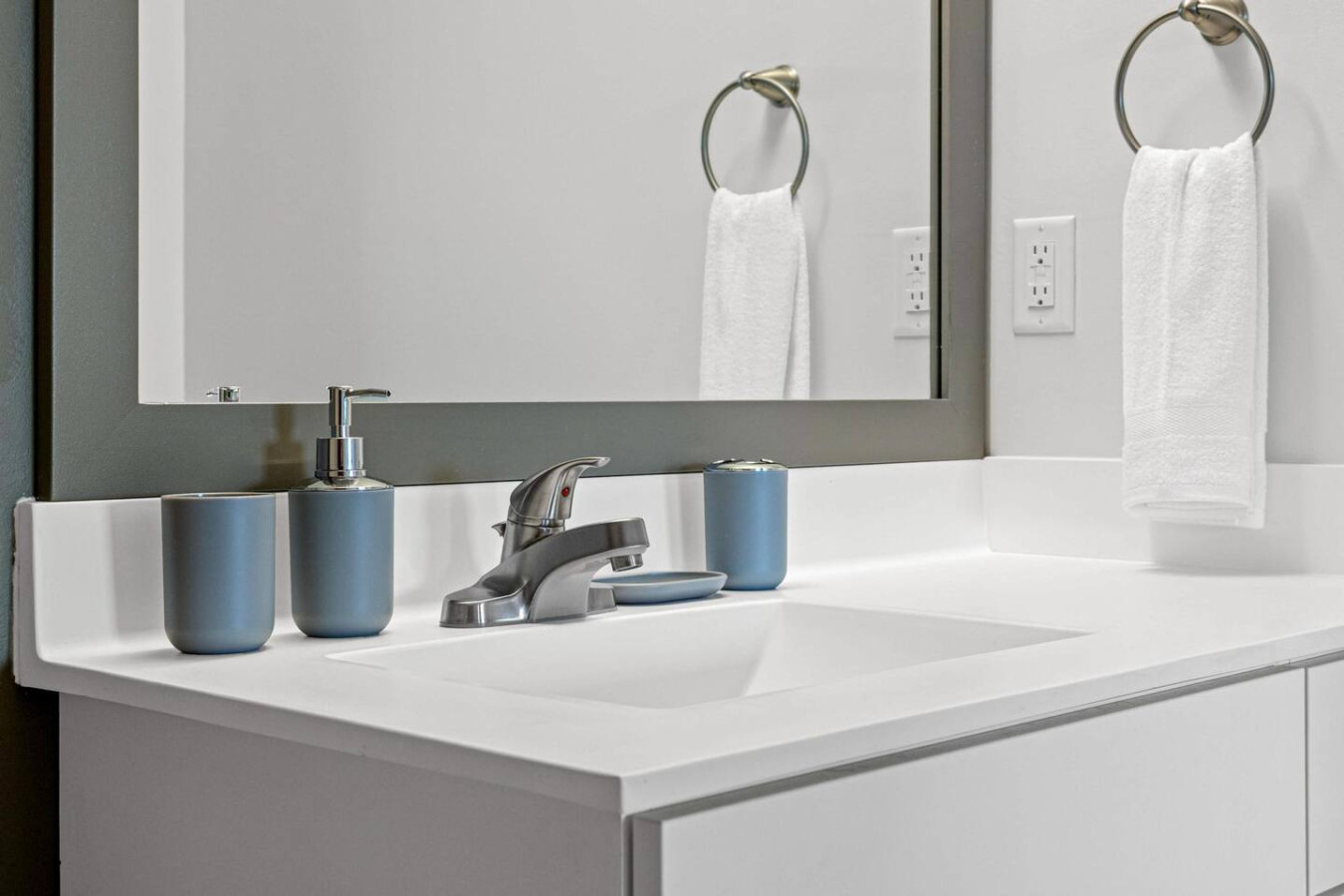 You feel a sense of calm as you enter the bathroom, where the thoughtful design and high-quality materials create a serene environment.