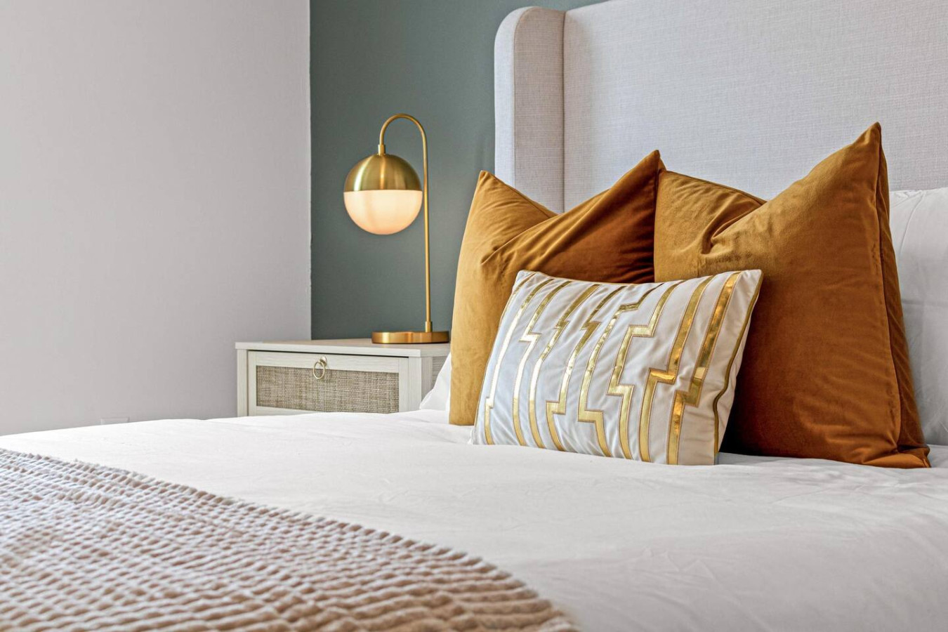 The bedroom’s serene ambiance invites you to relax, with a plush bed that promises a restful night's sleep.