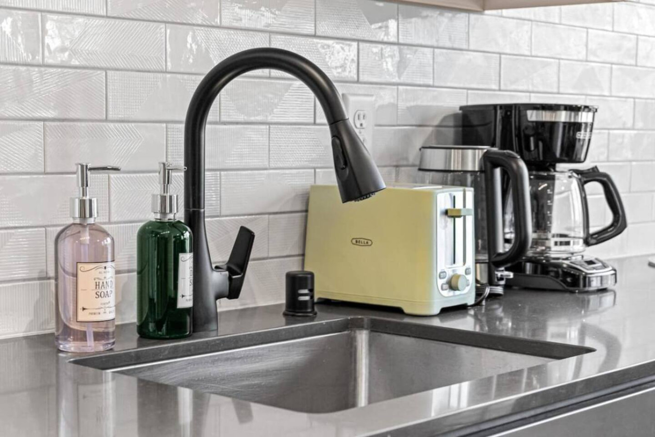 The kitchen’s open layout allows you to move freely as you prepare meals, with everything you need at your fingertips.