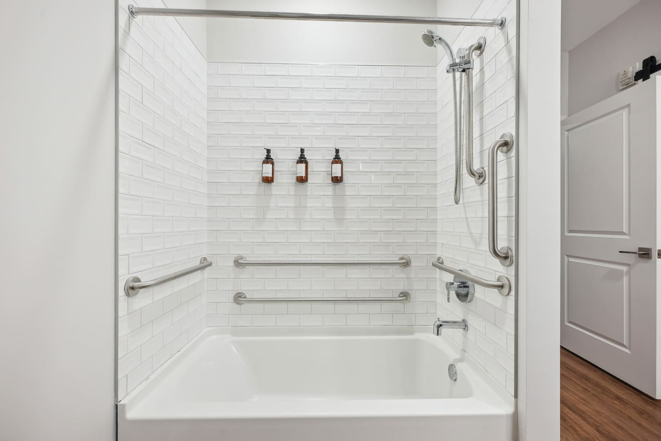 Experience a spa-like retreat in this beautifully appointed bathroom, featuring a full tub, modern fixtures, and thoughtful details. Refresh and rejuvenate with our luxury toiletries and plush towels.