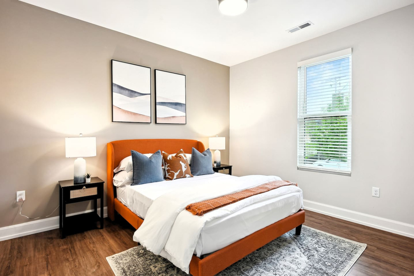 Bright and welcoming room with queen bed, perfect for families or friends traveling together.
