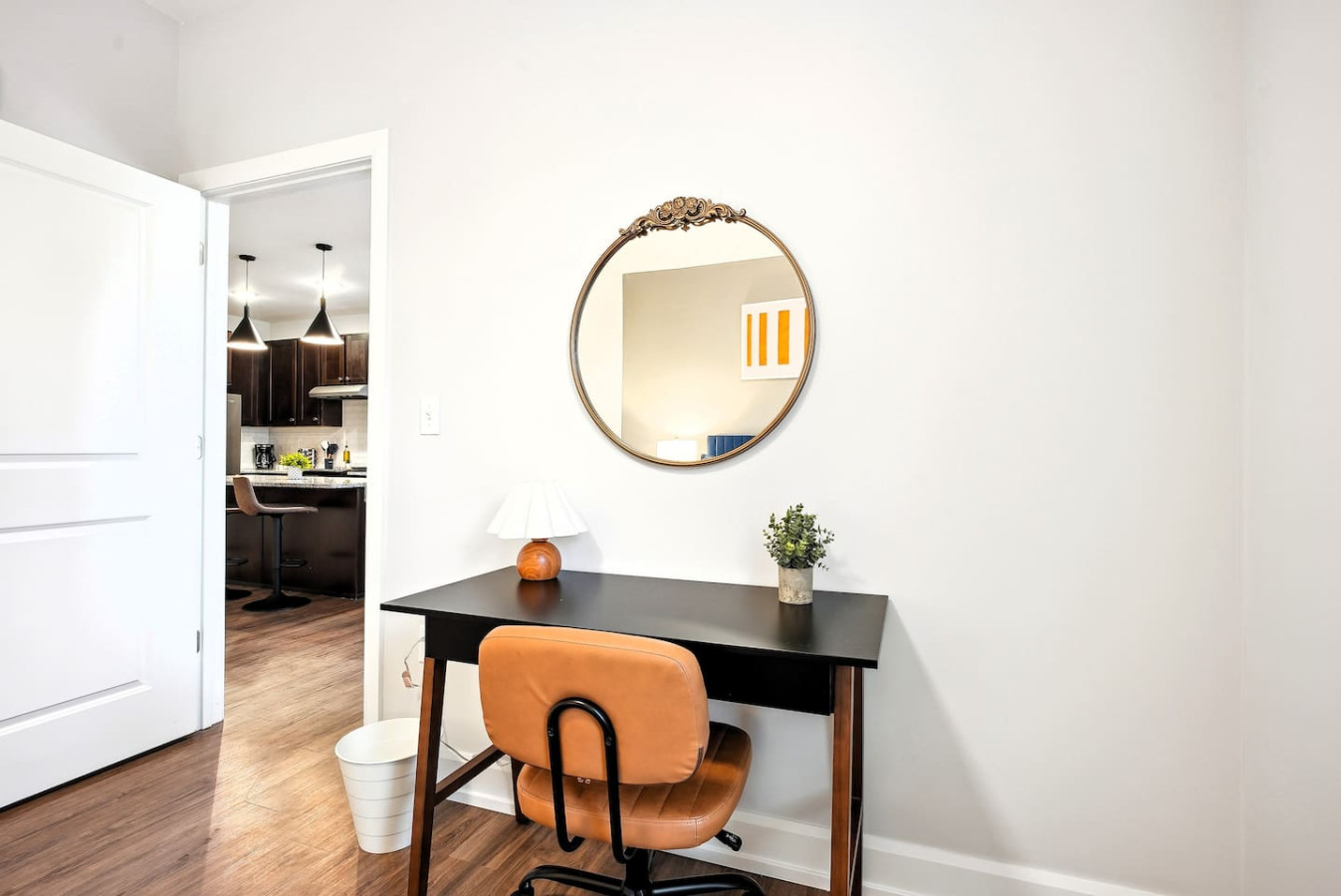This cozy workspace area is perfect for productivity. Enjoy natural light, a comfortable chair, and a stylish desk setup. Ideal for work-from-home needs or planning your Dallas adventures.