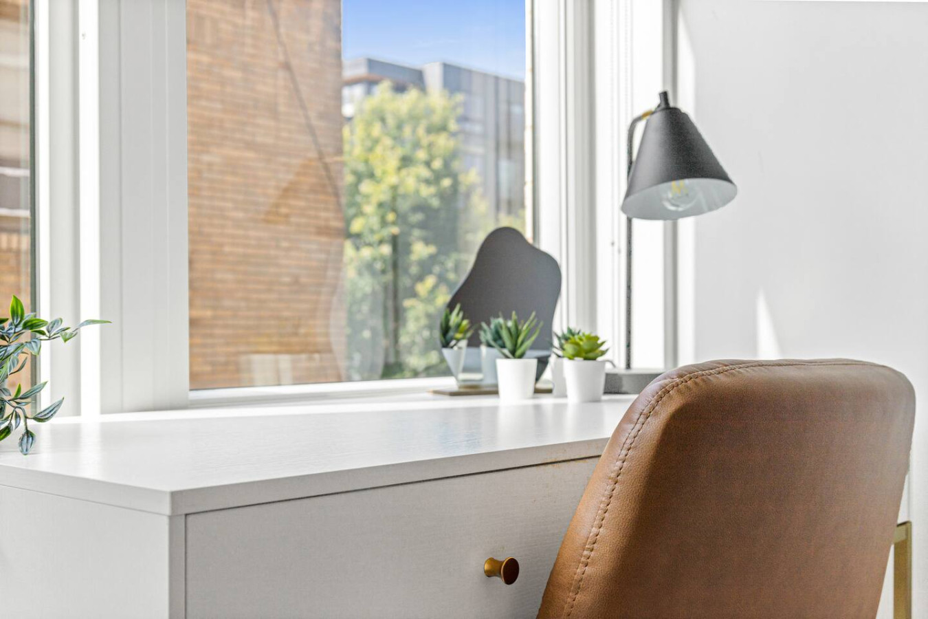 Your home office away from home! Bright, organized, and perfect for remote work.