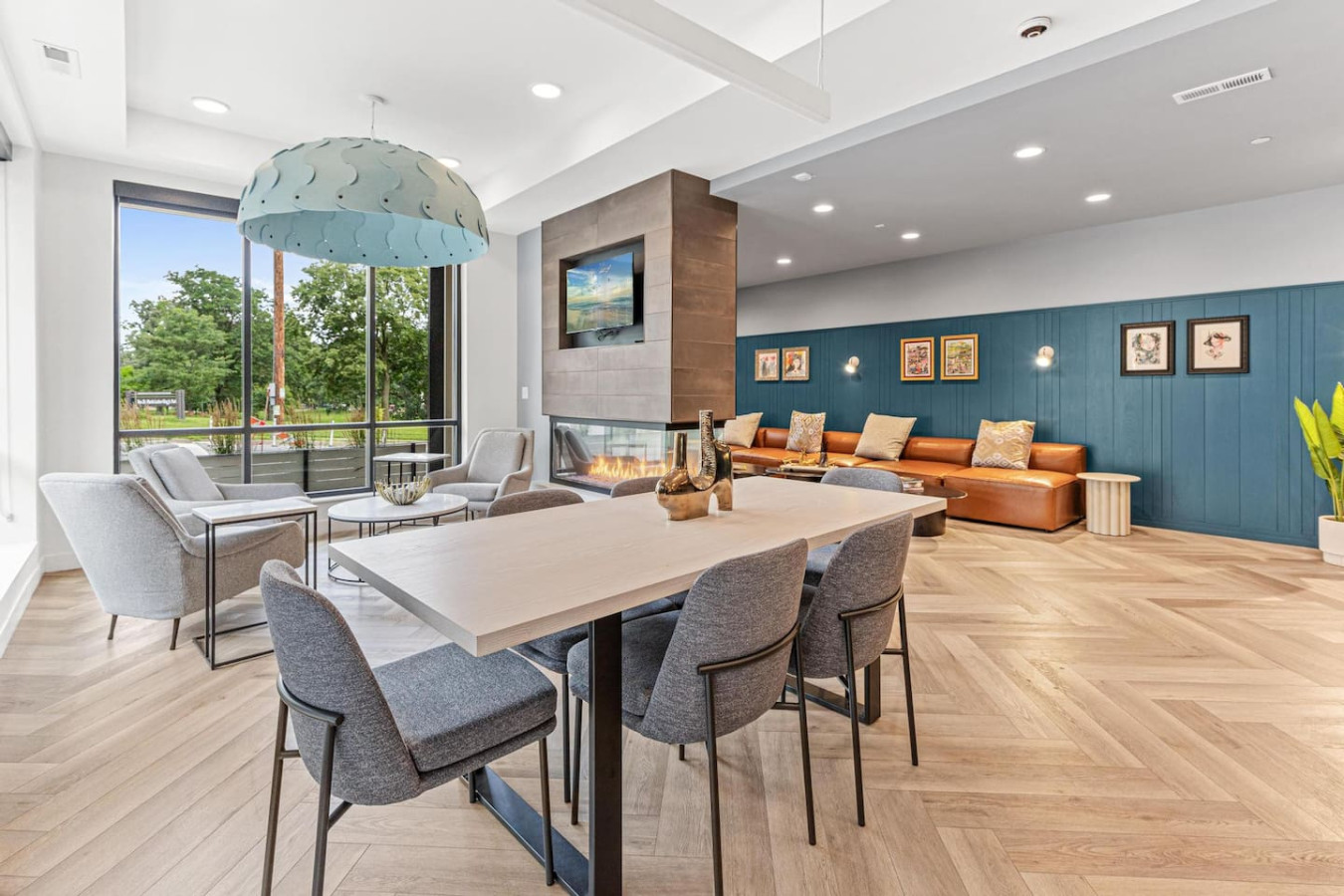Relax and chat in this shared lounge with fireplace and seating.
