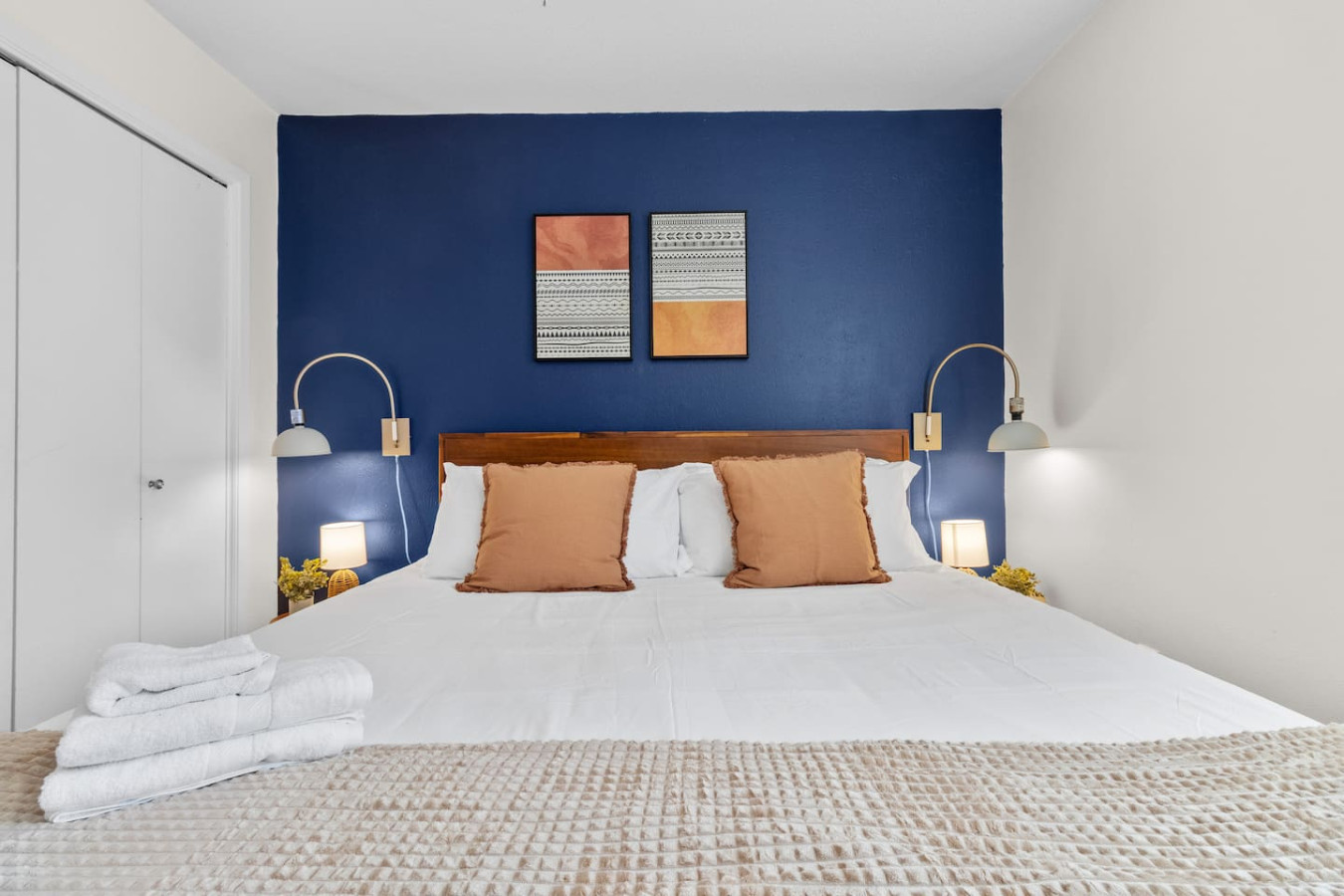 Spacious king bed with plush linens for deep rest