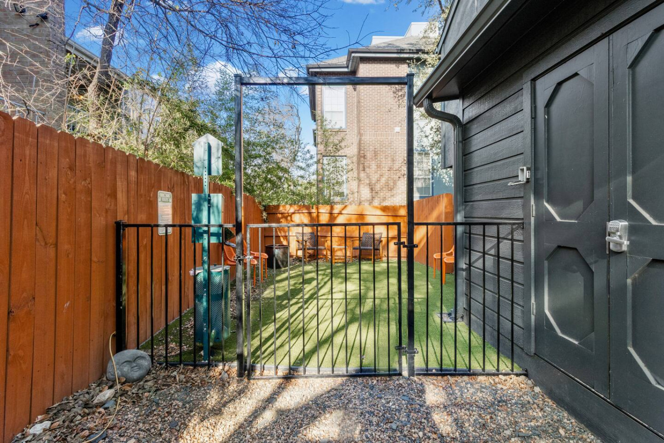 Fully fenced on-site dog park for pet guests