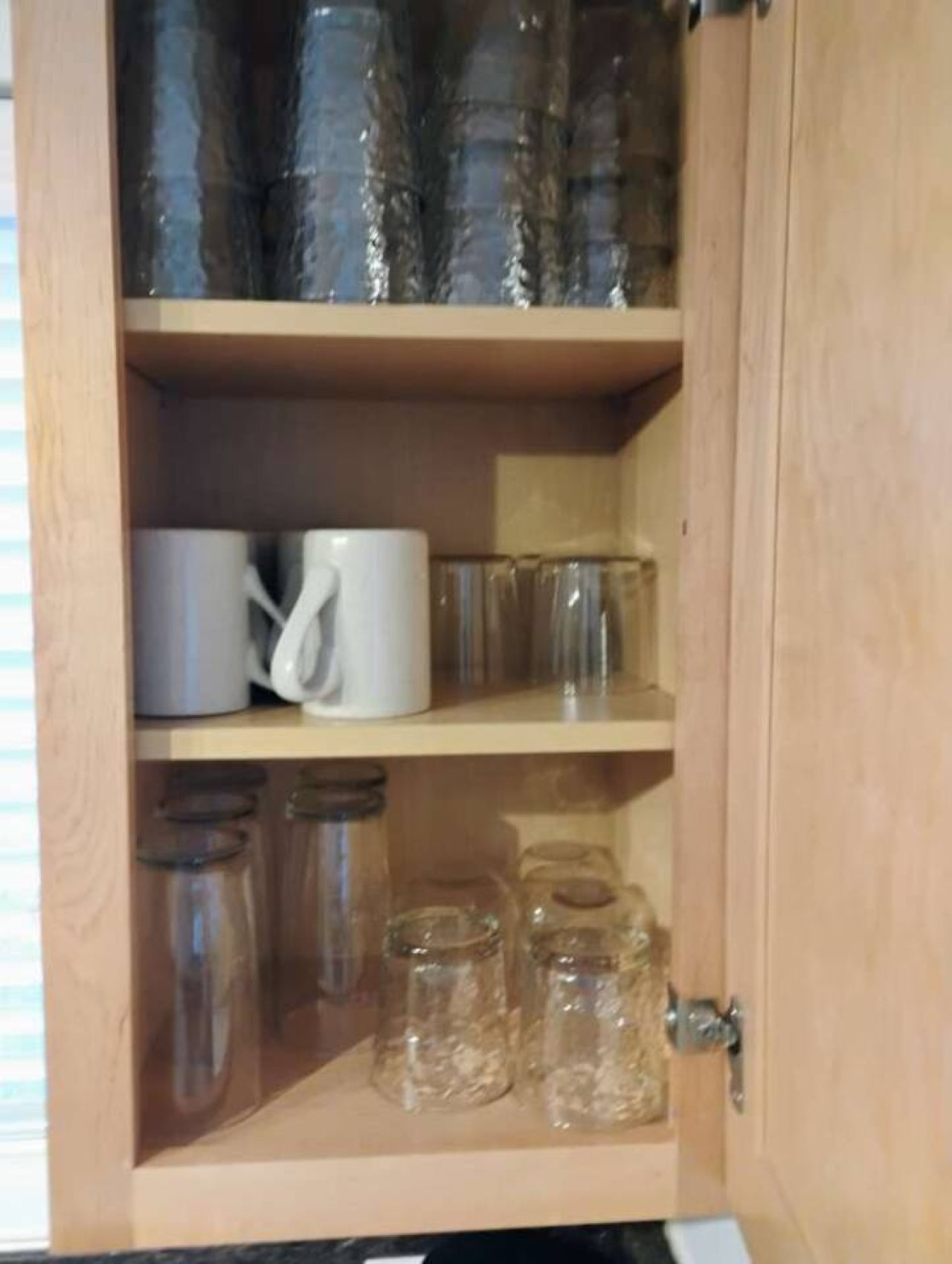 Glassware and mugs ready for coffee, wine, or evening drinks