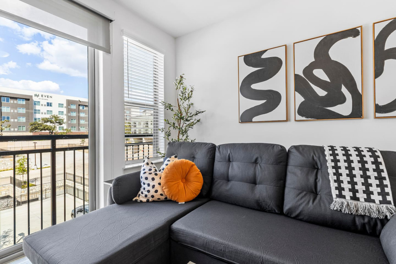 Relaxing in the living room, the cozy furniture and elegant decor create a serene and inviting atmosphere.