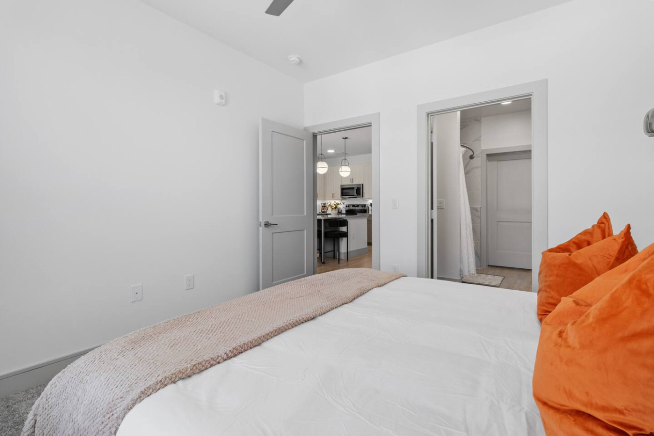 A sumptuous retreat awaits, with a bed that promises deep sleep and a room that exudes tranquil privacy.