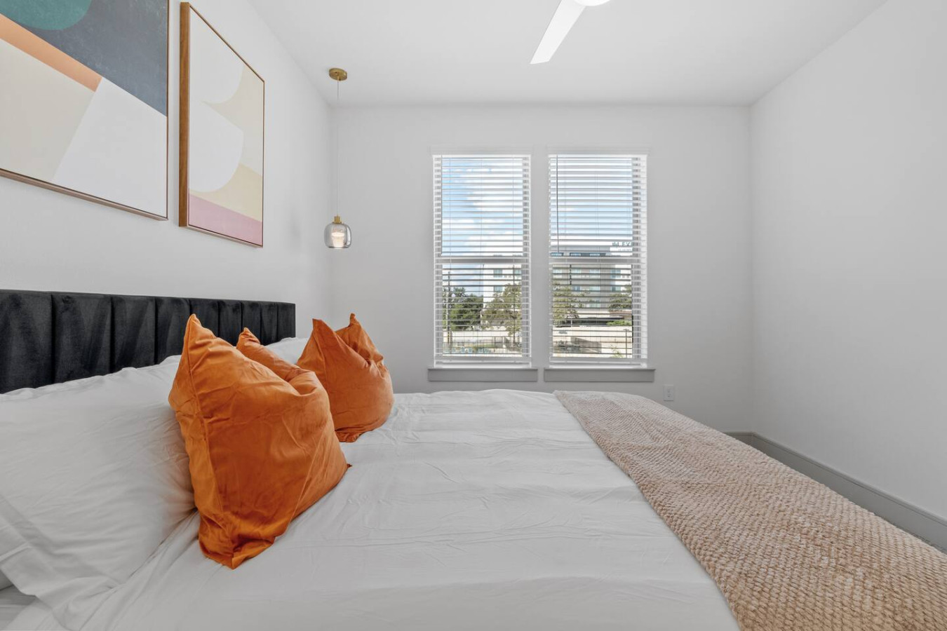 Relax in style—the bedroom’s serene charm and plush bed create the ultimate sanctuary for restful nights.