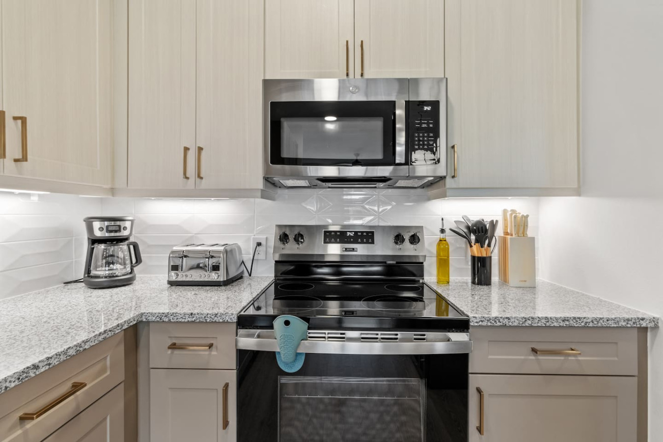 The kitchen beckons you to get creative, blending style and practicality into the perfect space for cooking up new recipes and fresh ideas.