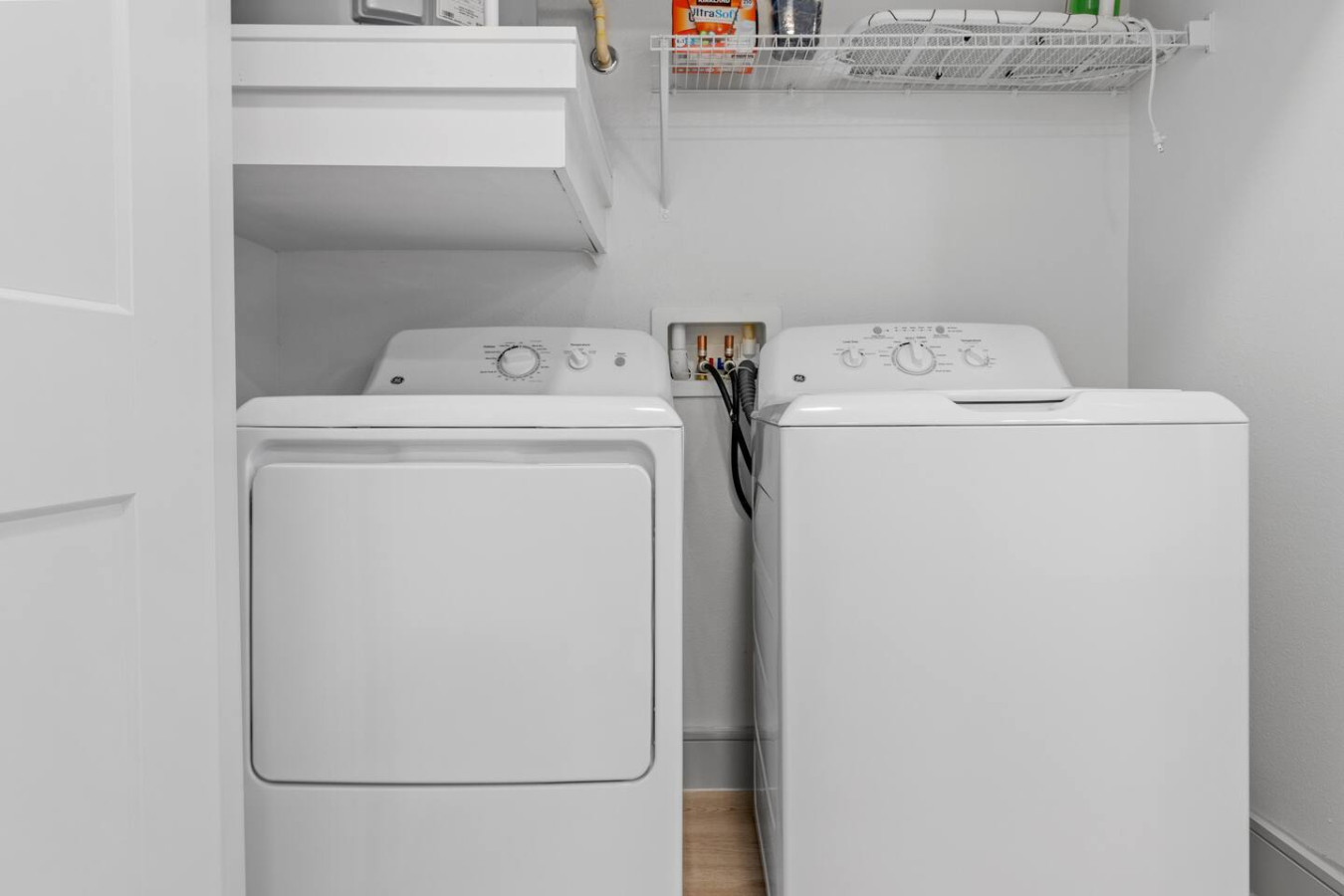 With state-of-the-art appliances and generous storage, this laundry room makes keeping things neat effortless.