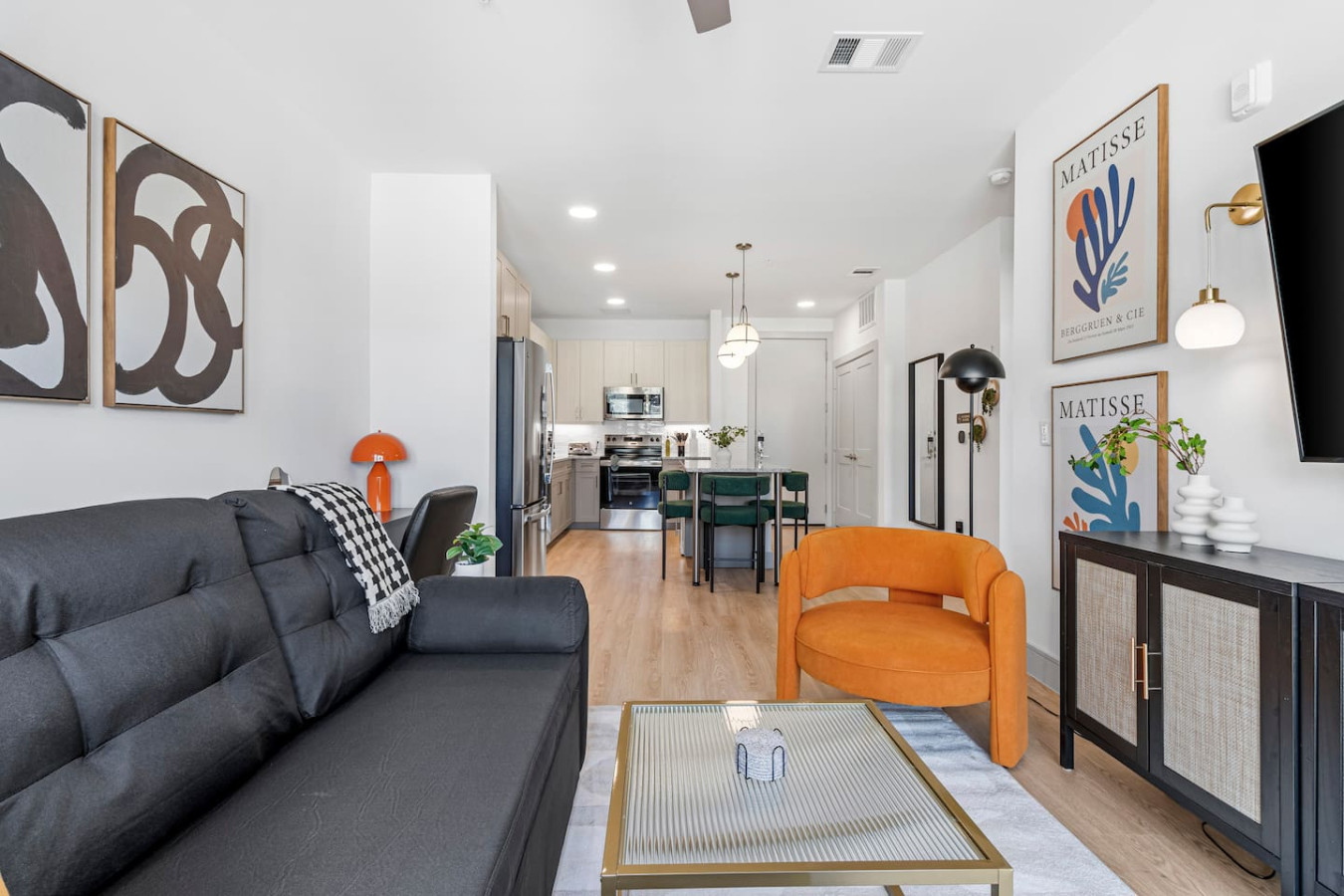 A sense of peace sets in as you step into the living room, enhanced by its warm décor and tranquil tones.