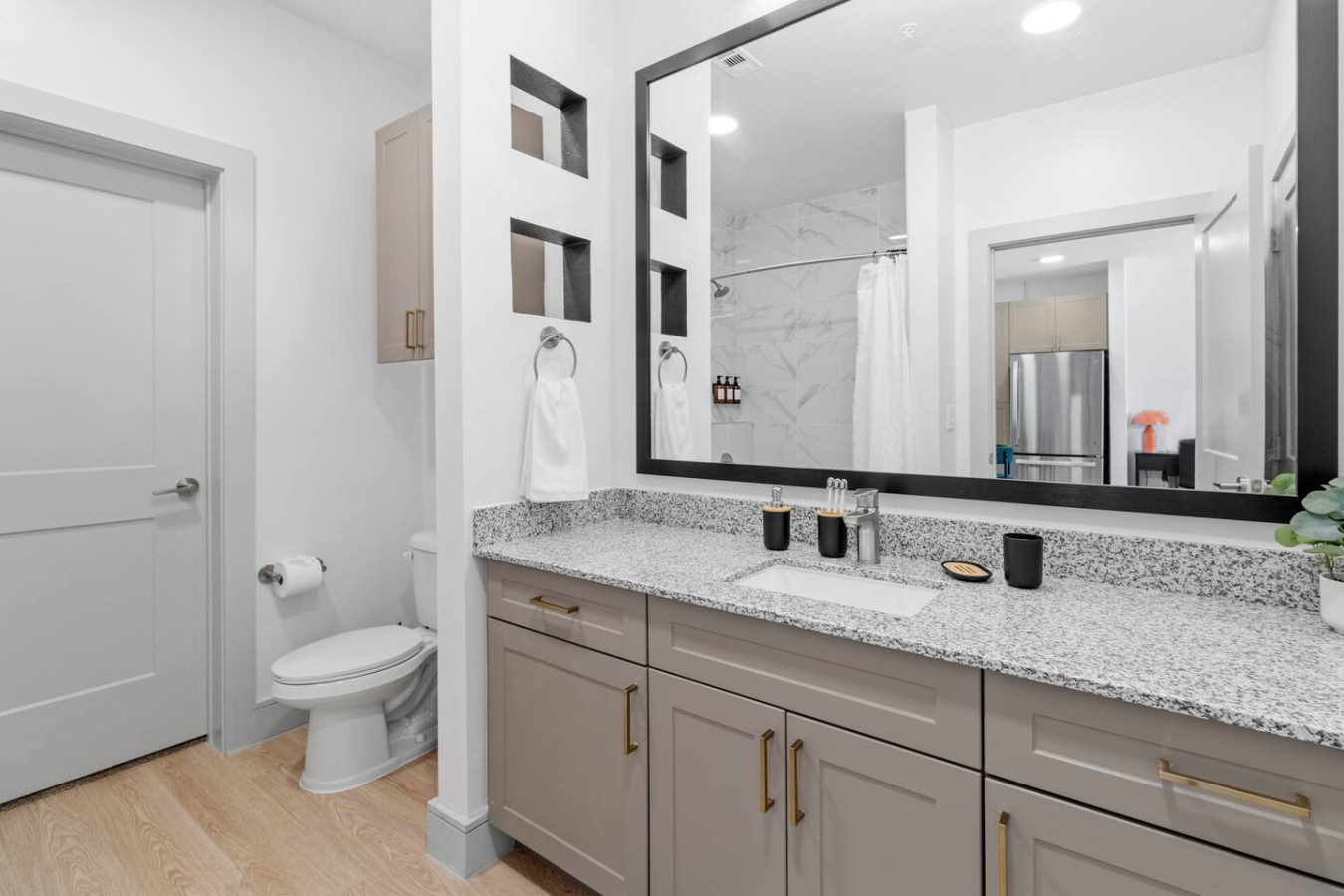 A tranquil bathroom featuring high-quality materials and a design that soothes the senses.