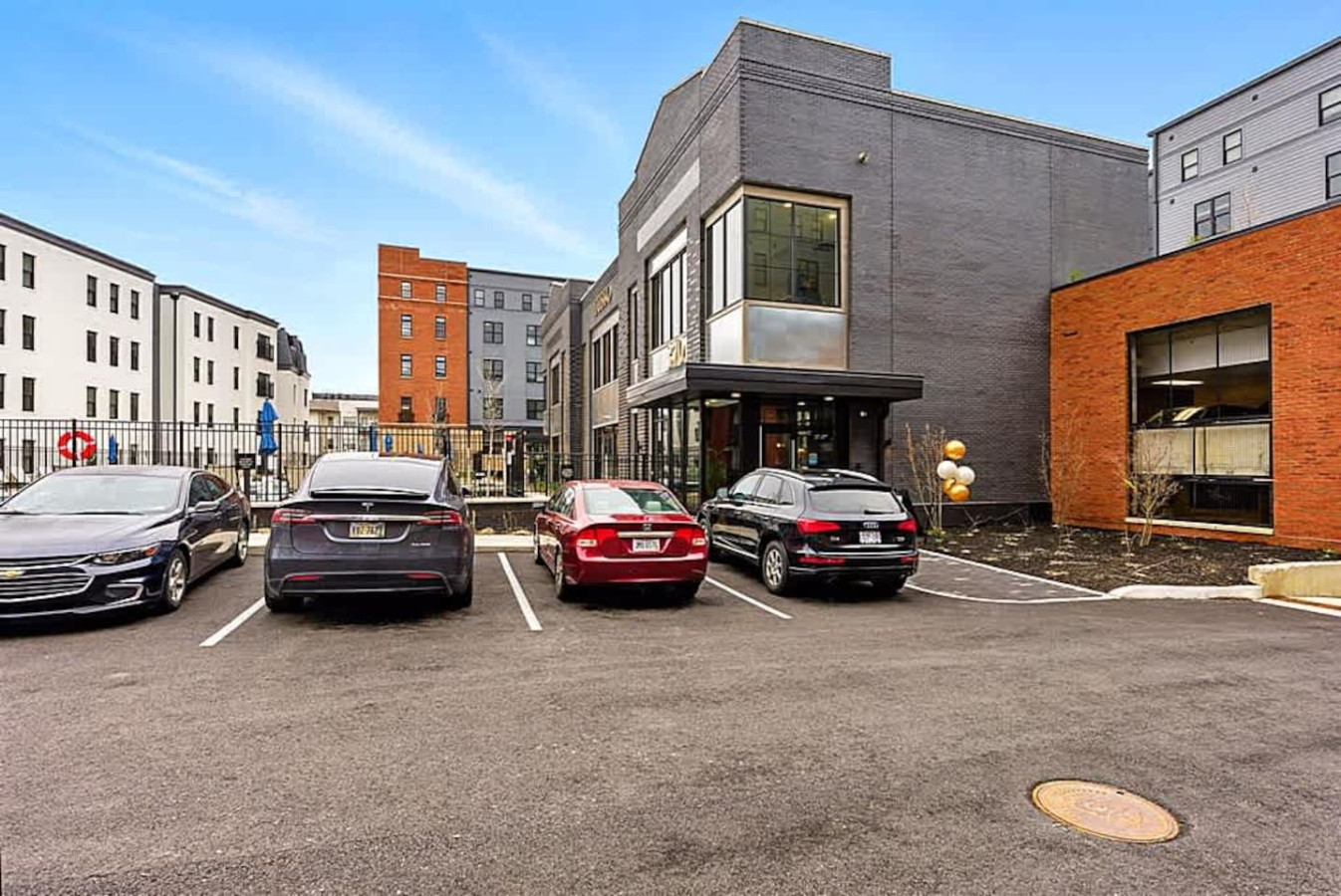 A convenient parking area located near the property, offering easy access for guests arriving by car. The open layout and well marked spaces make parking simple and stress free throughout your visit.