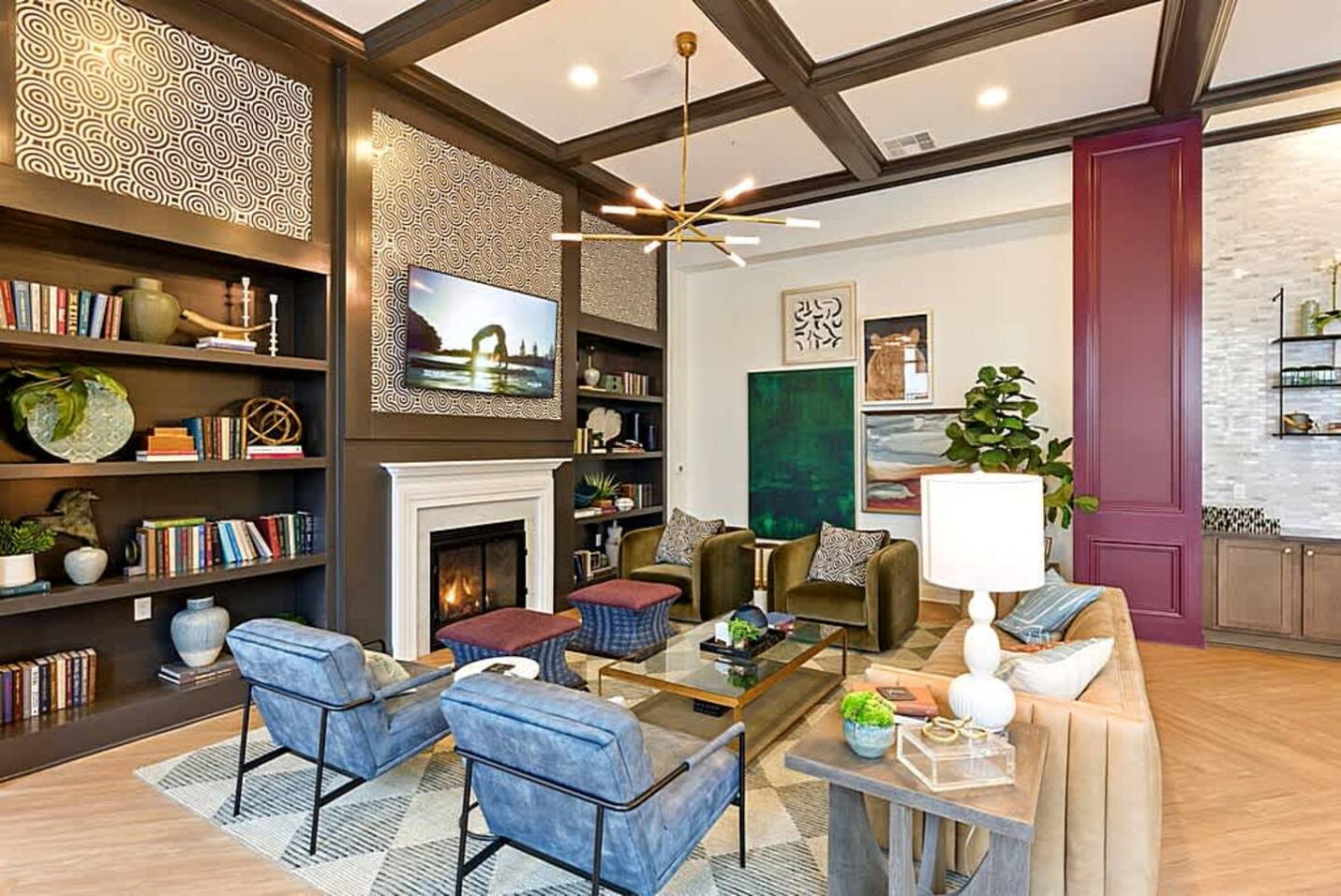 A second view of the inviting lounge showcasing soft seating, warm accent lighting, and tasteful décor. Ideal for quiet reading, casual gatherings, or unwinding after a busy day in a stylish community setting.