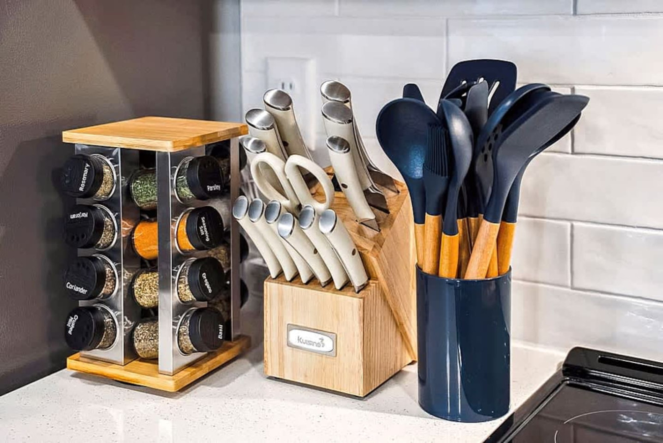 A fully stocked kitchen station with knives, utensils, and a spice rack. Designed for travelers who enjoy cooking, offering reliable tools and convenient access to everyday essentials.