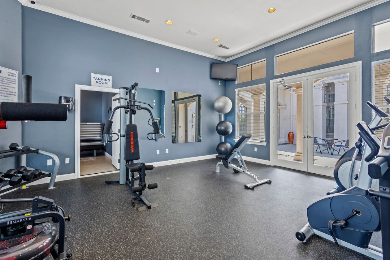 Well-equipped gym with modern machines and free weights to keep up with your fitness routine.