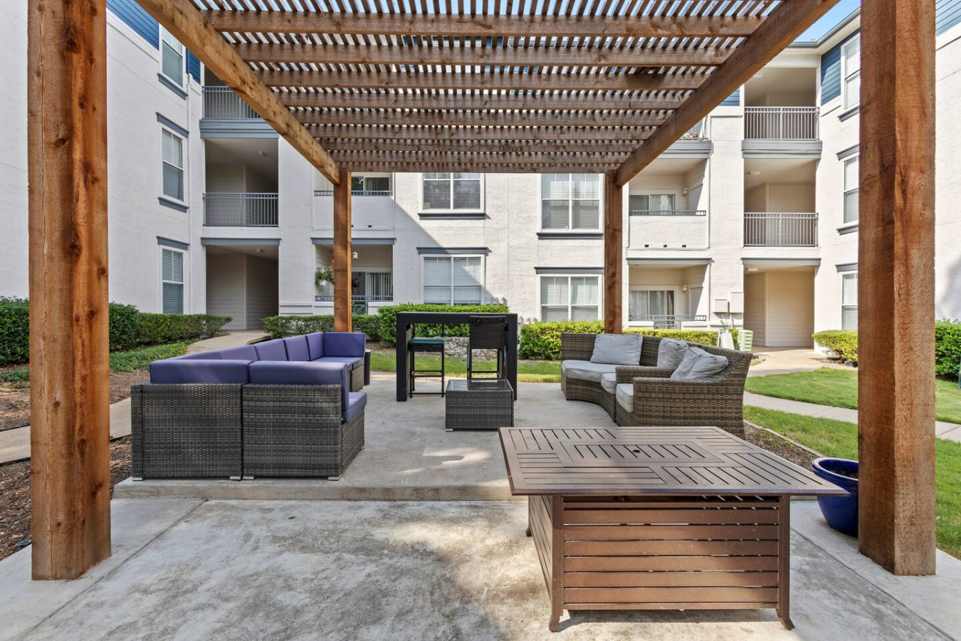 "Barbecue area with plenty of seating, perfect for outdoor meals and gatherings."