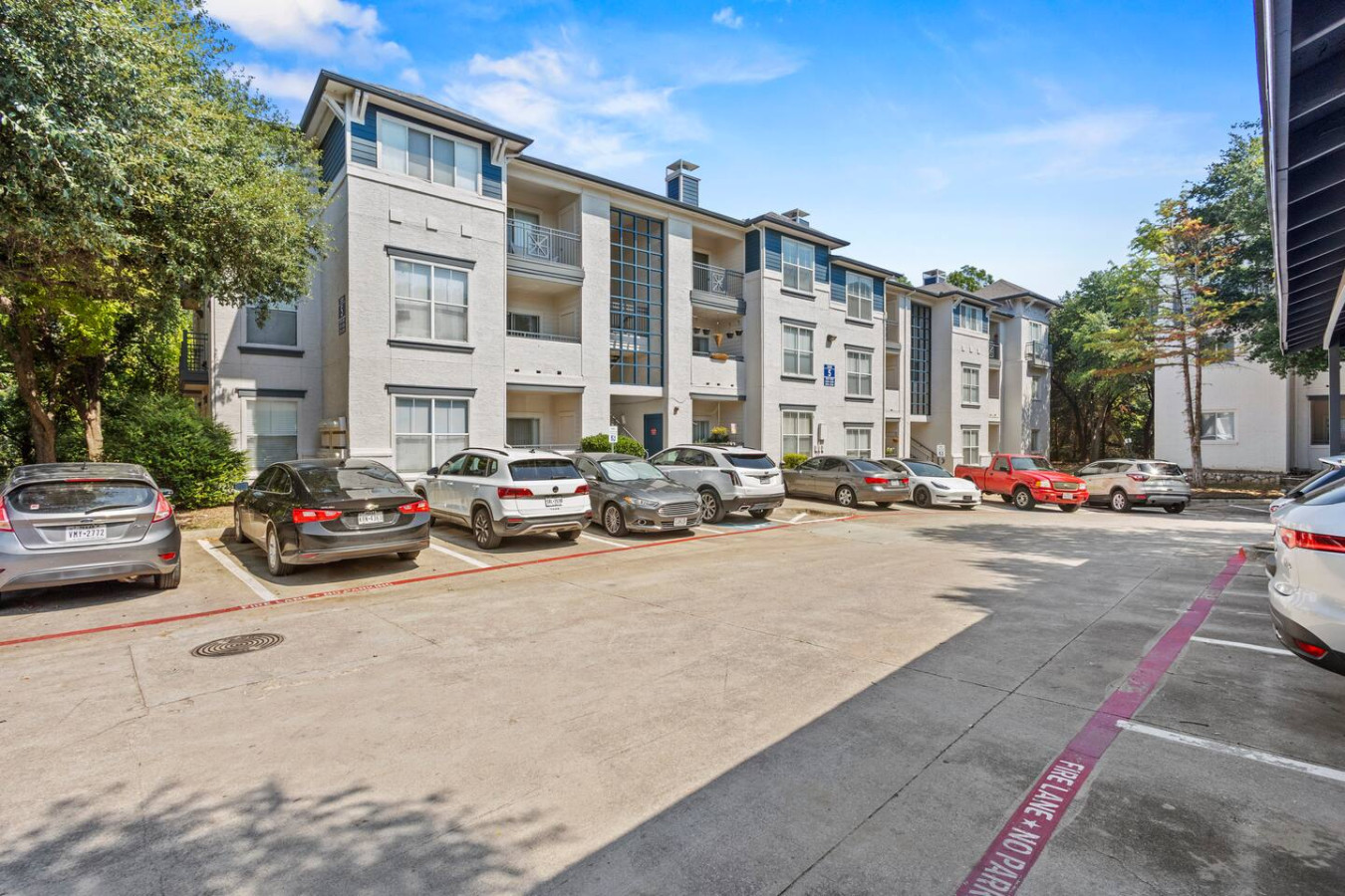 Located in a secure gated community with multiple buildings.