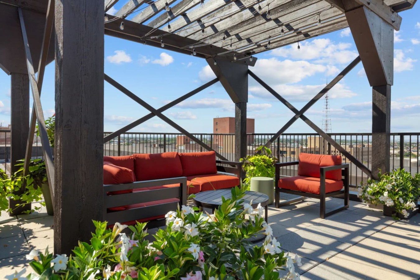 Roof terrace pergola with sofas