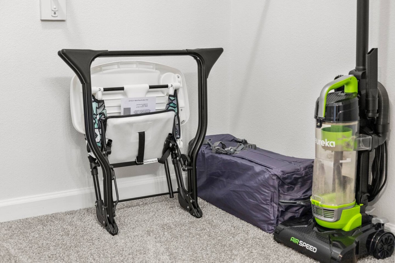 Vacuum, folding chair, and extra gear provided for your convenience.