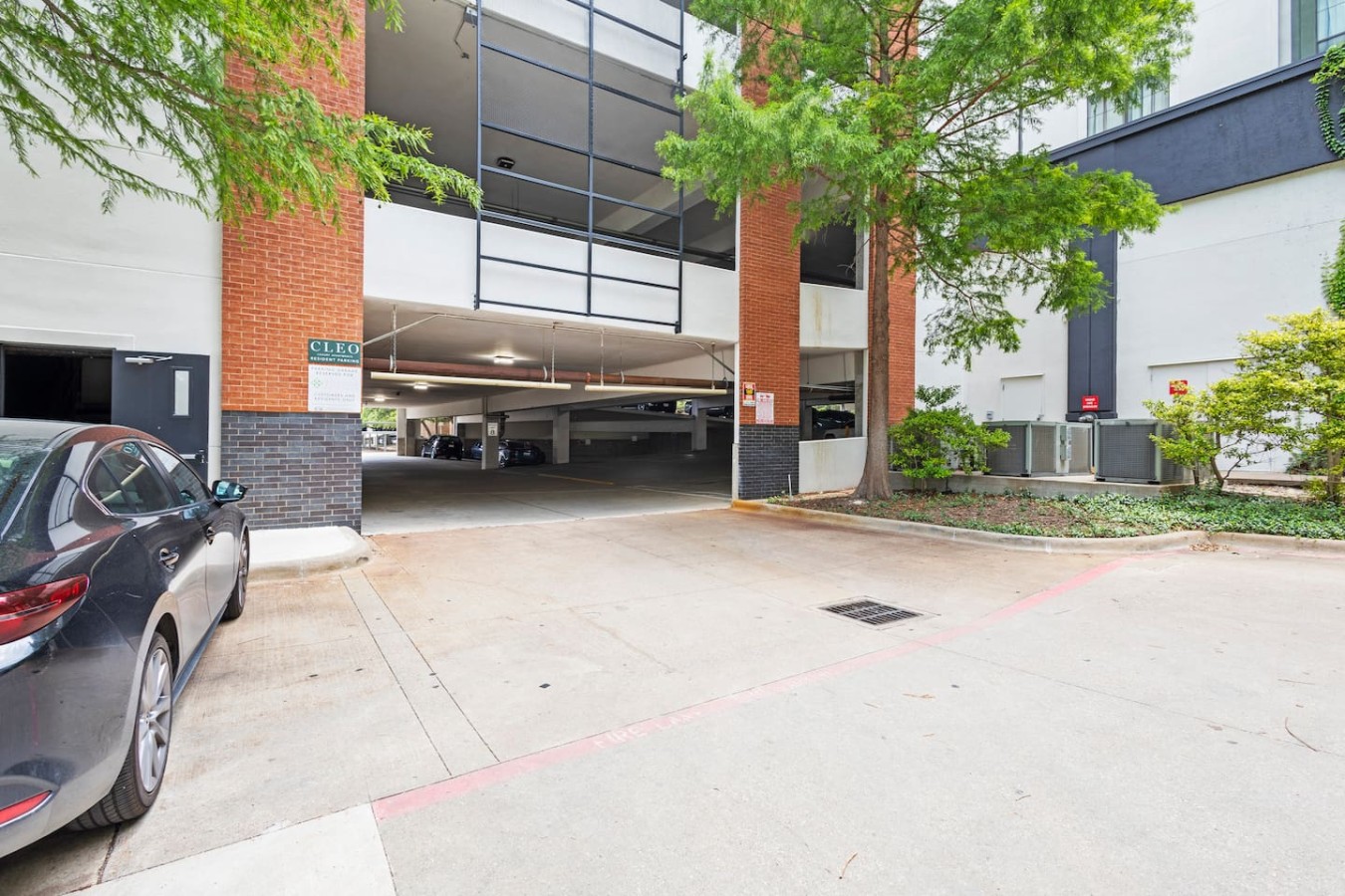 Covered parking garage entrance for convenient guest arrival.