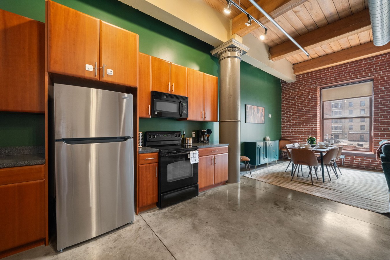 Cook, Dine & Enjoy – A fully equipped kitchen paired with a welcoming dining area for easy meals at home.