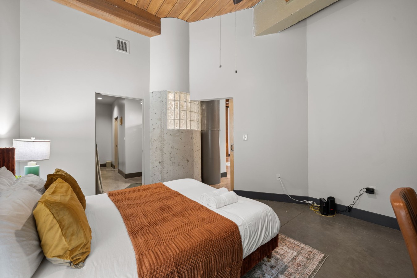 Sweet Dreams Await – Enjoy a peaceful night's rest in this inviting queen bedroom.